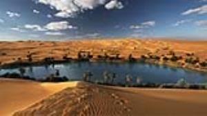 عکس/ نگاهی به تلماسه‌های باشکوه و دریاچه‌ای تماشایی در کشور لیبی