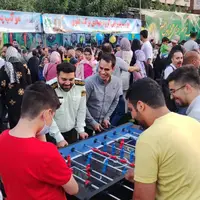عکس/ فوتبال دستی بازی افسر پلیس در میهمانی عید غدیر