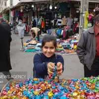عکس/ حال و هوای بازار عید نوروز در آمل