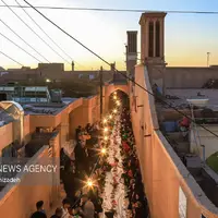 عکس/ ضیافت افطار در محله «گلچینان» یزد