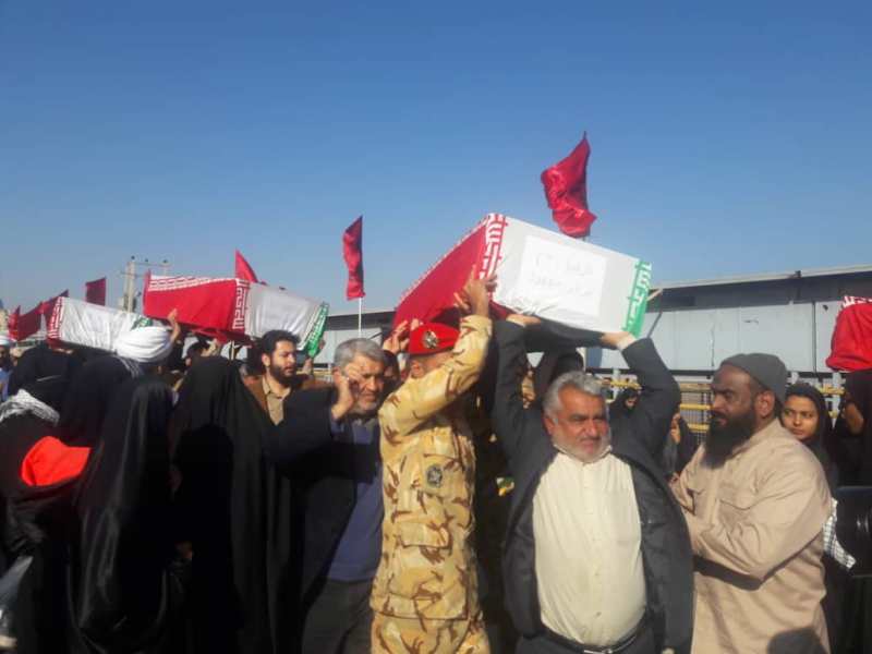 پیکرهای 72 شهید دفاع مقدس از مرز شلمچه به خاک وطن منتقل شدند