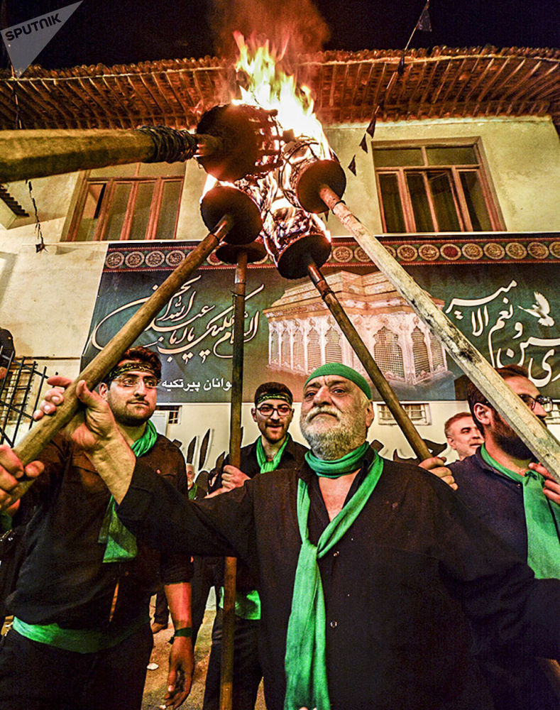 عکس/ مراسم دسته چوبی در گرگان ایران