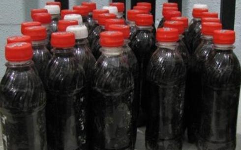 کشف 295 کیلو و 440 گرم تریاک جاسازی شده در بطری های آب معدنی