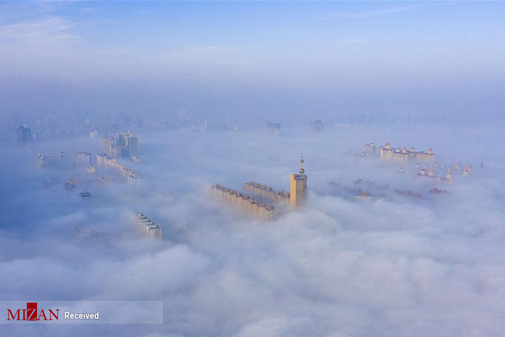 آسمان خراش‌های چین در مه