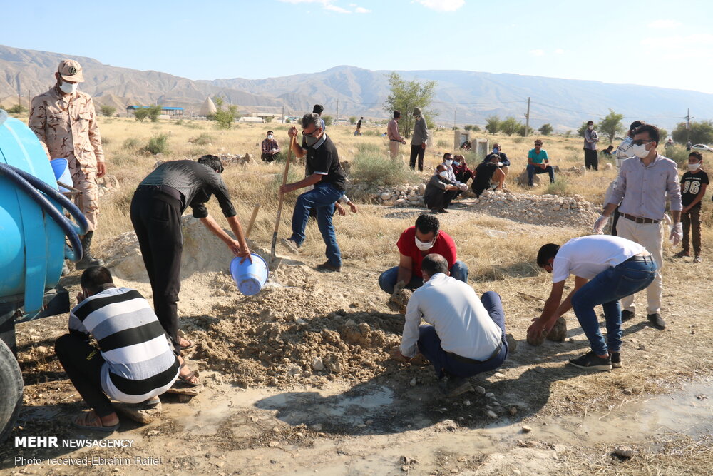 مراسم خاکسپاری شهید فخرالدین فلک نازی در روستای دهتل