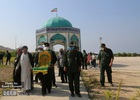خادمین آستان قدس رضوی در یادمان شهدای گمنام عسلویه