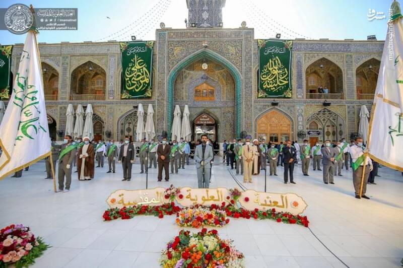 تعویض پرچم حرم حضرت علی(ع)