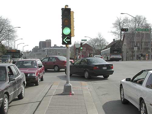 Turning left. Turn at the Traffic Lights. Turn left the Traffic Lights.. Turn left on the Traffic Lights. Left turn Light.