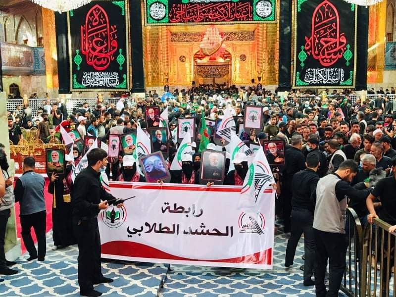 عکس/ موکب دانشجویان بصره با تصاویر سرداران مقاومت در دست