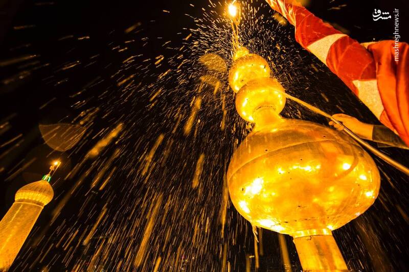 عکس/ شستشوی گنبد حرم امام حسین(ع)