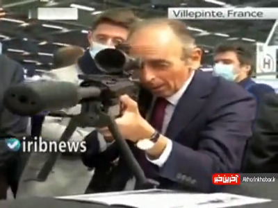 رقیب مکرون، خبرنگاران را با تفنگ نشانه گرفت!