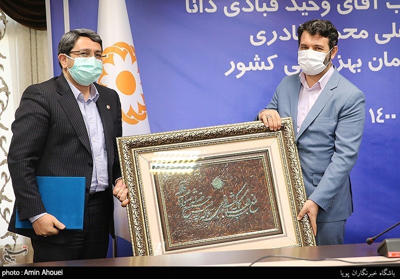 عکس/ ژست رئیس جدید سازمان بهزیستی در مراسم معارفه