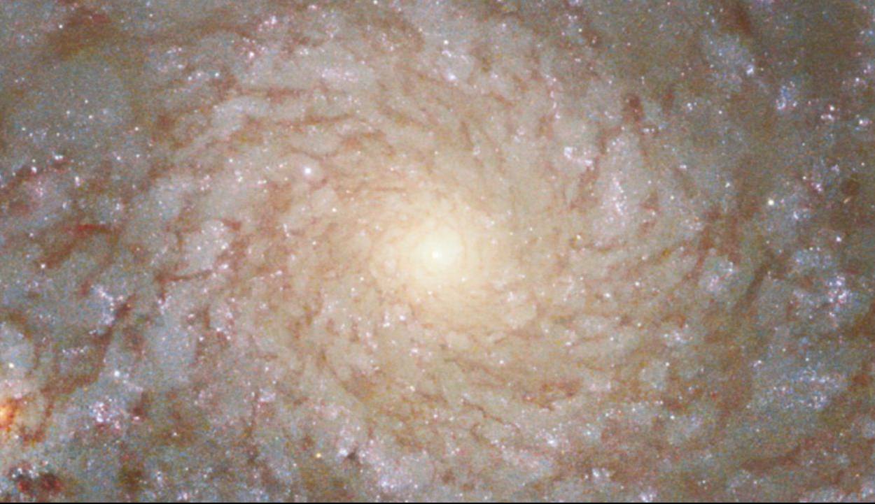 تلسکوپ هابل تصویری زیبا از یک کهکشان مارپیچ در فاصله 60 میلیون سال نوری ثبت کرد تلسکوپ هابل تصویری زیبا از یک کهکشان مارپیچ در فاصله 60 میلیون سال نوری ثبت کرد