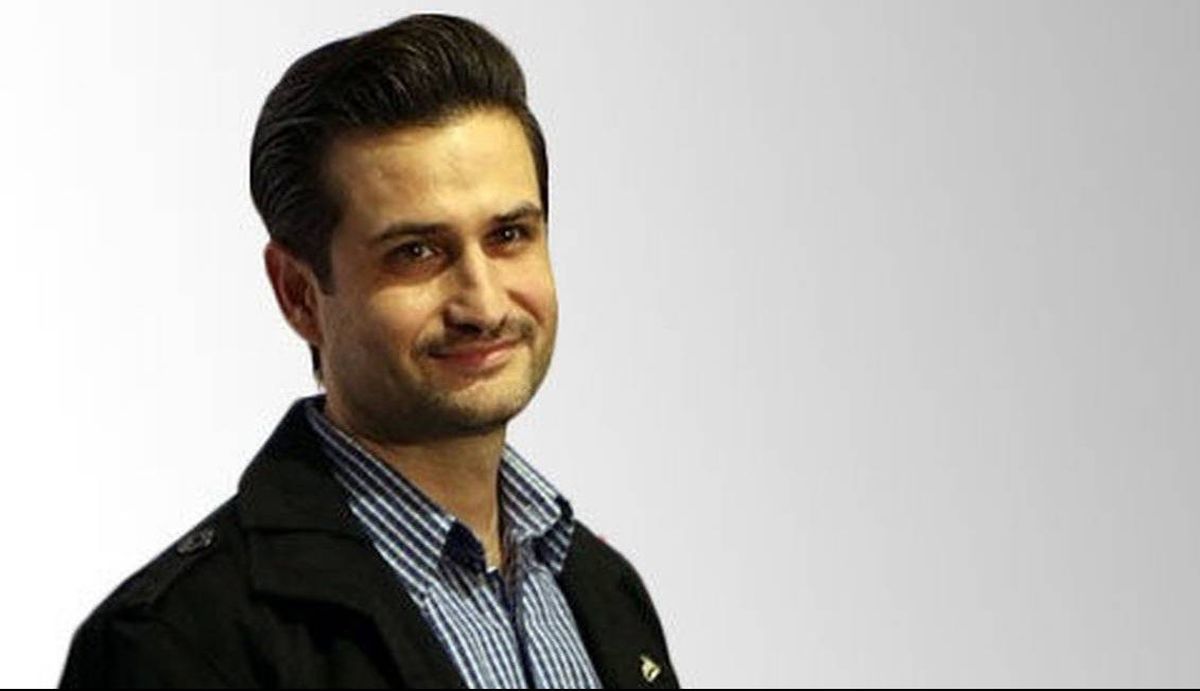 چهره ها/ تعطیلات پویا امینی و همسرش در ساحل