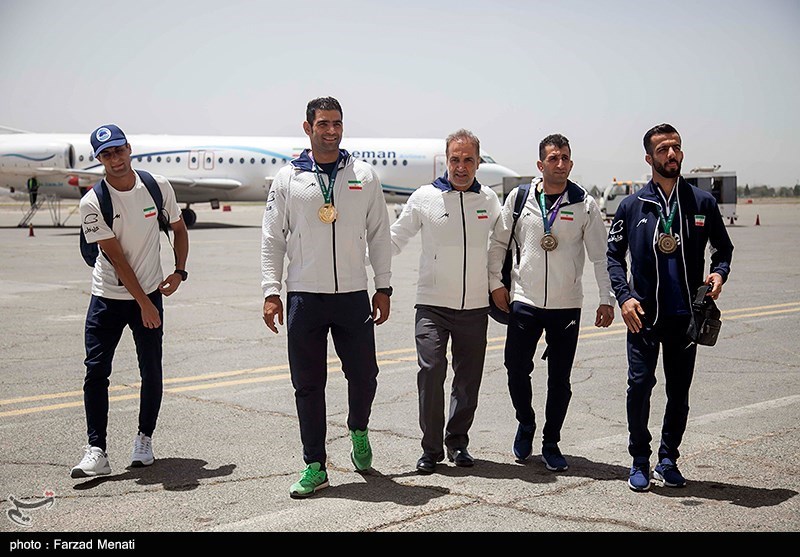 عکس/ استقبال از قهرمانان کشتی و جودو پارالمپیک در کرمانشاه