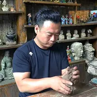 ساخت مجسمه‌های سفالی از مردم توسط یک هنرمند چینی