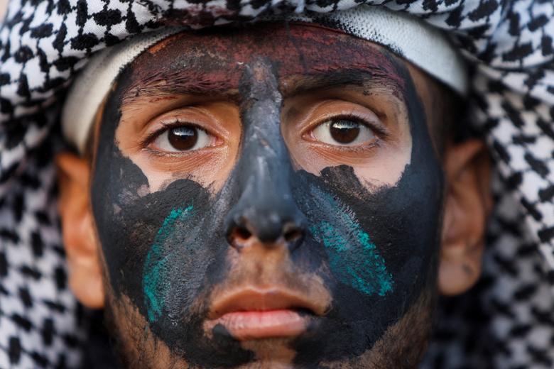شمایل یک فلسطینی در راهپیمایی ضد اسراییلی