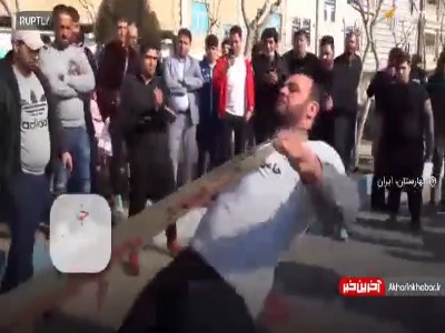 کشیدن کامیون ۱۳ تنی با گردن توسط جوان ایرانی