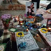 لحظه سال تحویل در کنارِ مزار شهدای امنیت مشهد