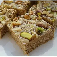 طرز تهیه «سمسمیه» شیرینی کنجدی معروف عربی