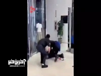 تصاویر عجیب لحظه سرقت از فروشگاه پوشاک و درگیری حراست با سارق