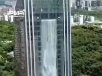 افتتاح آسمان خراش با بزرگترین آبشار مصنوعی جهان در چین