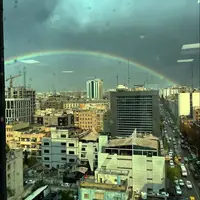 عکس/ رنگین‌کمانی زیبا در آسمان تهران