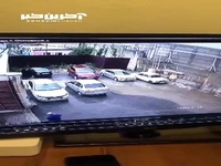 فروریختن دیوار حائل در روسیه بر روی خودروها