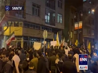 تجمع دانشجویان و کفن‌پوشان مقابل ساختمان عالی شورای امنیت ملی
