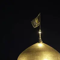 تعویض پرچم گنبد منور رضوی در واکنش به حادثه تروریستی کرمان