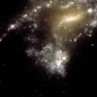 تصویر روز ناسا؛ ستارگان حاصل از ادغام کهکشان AM1054-325