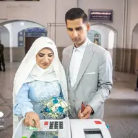 عکس/ رای دادن عروس و داماد اهل شهر ری در حرم حضرت عبدالعظیم(ع)