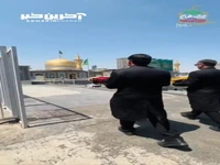 تصاویری از تعویض پرچم گنبد منور امام رضا علیه السلام پس از اعلام خبر شهادت رئیس جمهور