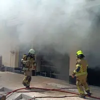 آتش‌سوزی یک مجتمع تجاری در بلوار سجاد مشهد مهار شد