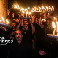 عکس/ آیین شمع گردانی در روستای بهدان