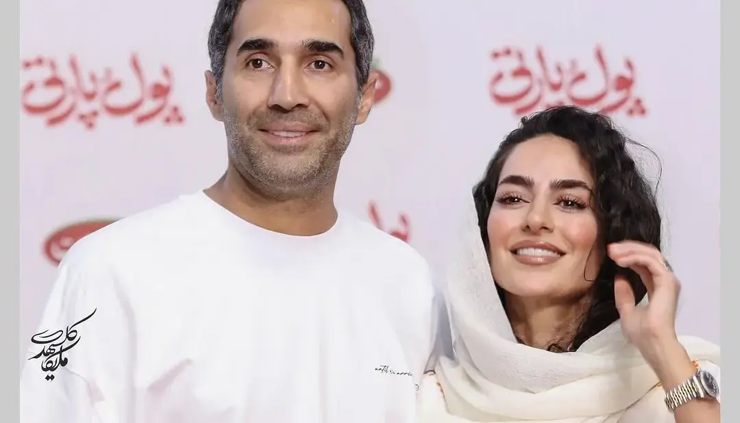 هادی کاظمی و همسرش در اکران یک فیلم