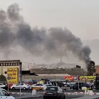 تصاویری از آتش‌سوزی در اطراف میدان آزادی تهران