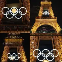 تصویر ماه برای لحظاتی در حلقه‌های المپیک بر روی برج ایفل 