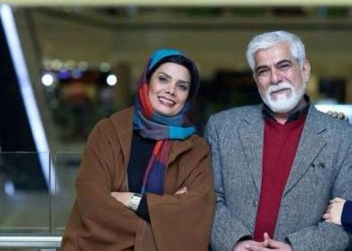 حسین پاکدل و همسرش در مقابل دوربین عکاسان 