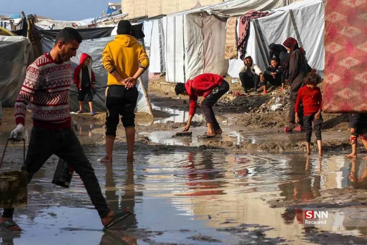 عکس/ موج باران و سرما در غزه
