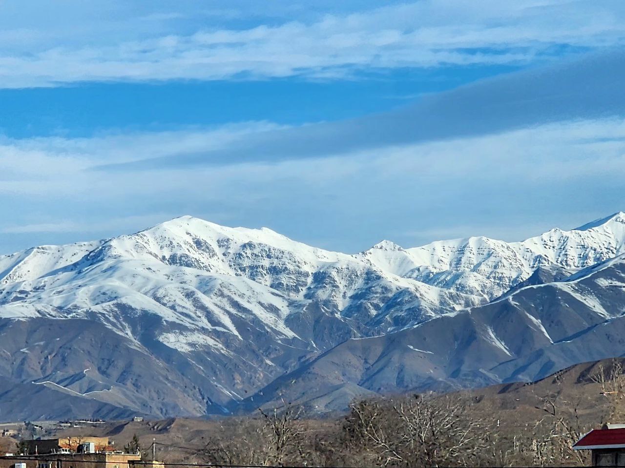 تصاویر زیبای رشته کوه های برفی بینالود 