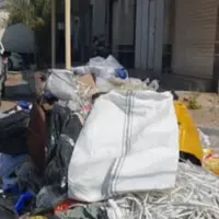 بنکداران اهواز در محاصره زباله و دود
