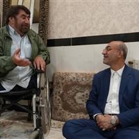 تجلیل استاندار کرمانشاه از جانباز اسدالله تارات و خانواده شهیدان امینی