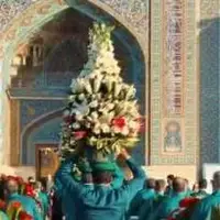گل آرایی روضه منوره و ضریح امام رضا(علیه‌السلام) توسط خدام در ایام دهه کرامت