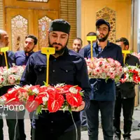 عکس/ گل آرایی ضریح حضرت معصومه (س) به مناسبت ولادت امام رضا(ع)