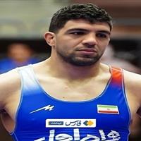 مدال برنز رقابت‌های بین المللی جام تختی برگردن کشتی‌گیر کرمانشاهی