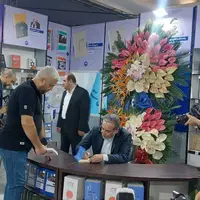  عکس/ حضور عراقچی در نمایشگاه کتاب