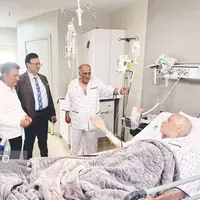 حسن روشن از بیمارستان مرخص شد؛ دیدار دو اسطوره در حضور قلعه‌نویی