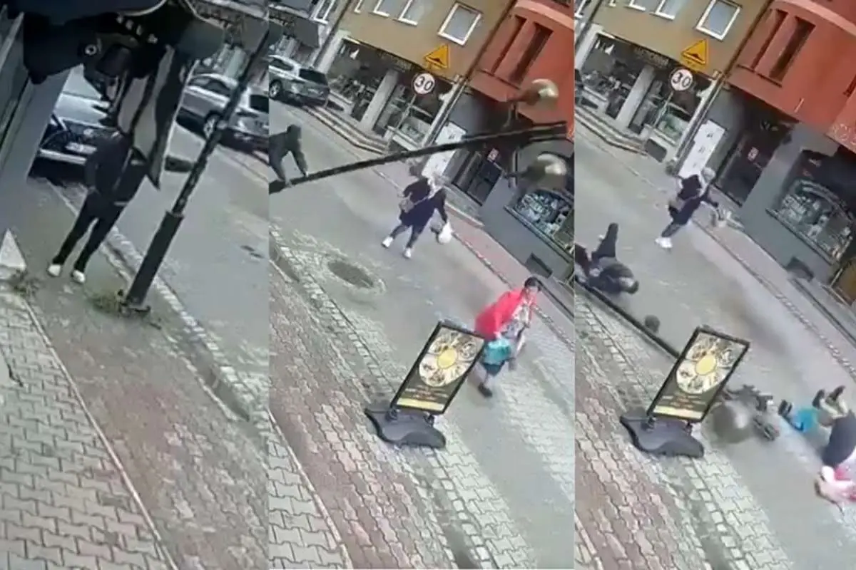 سقوط هولناک چراغ‌برق روی یک زن در پی بی‌احتیاطی مرد دیوانه