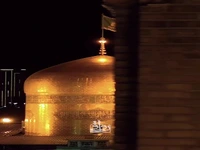می‌دونستید دور گنبد حرم امام رضا (ع) چی نوشته؟